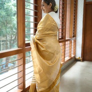 A Classic Ivory and Gold Saree - Image 2