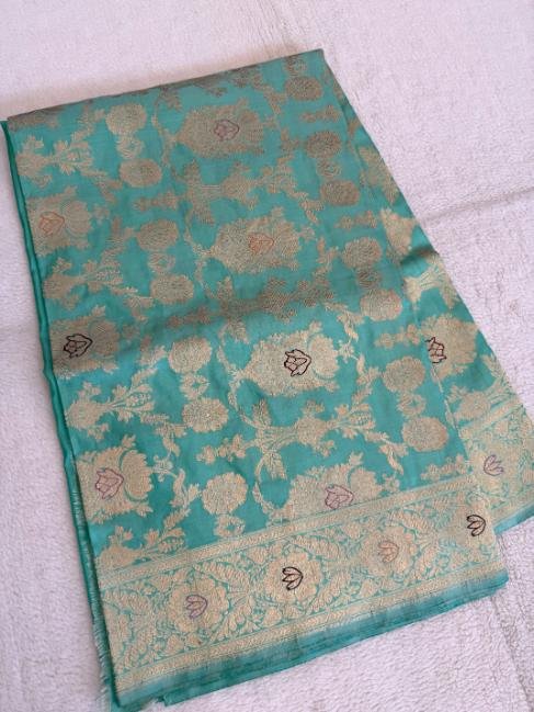 A Blue-Green Katan Banarasi Saree