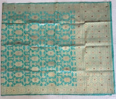 A Blue-Green Katan Banarasi Saree
