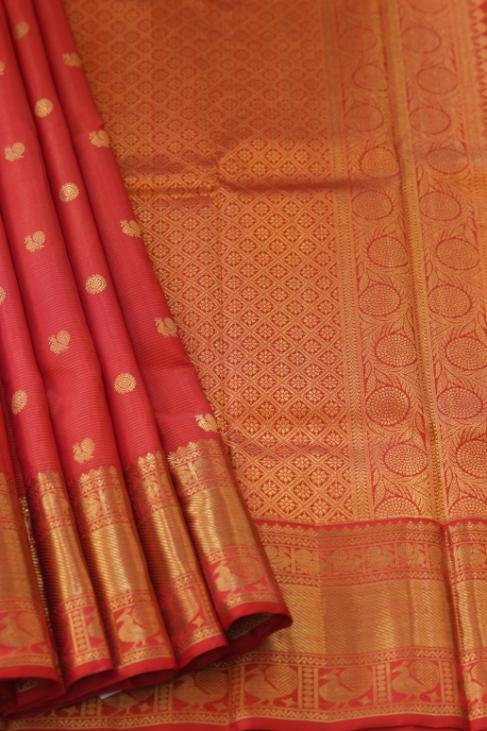 An all red bridal Kanjeevaram Saree
