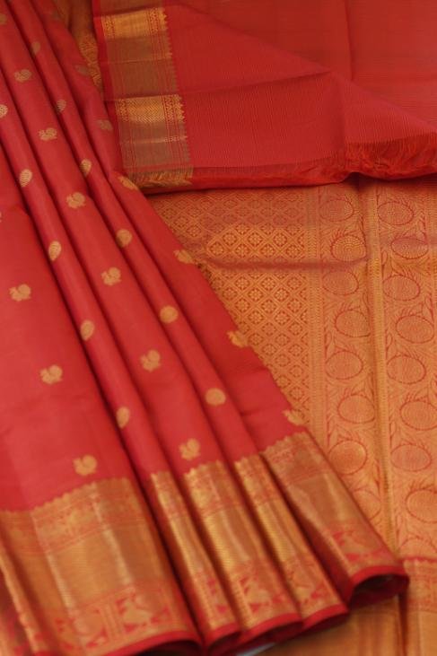 An all red bridal Kanjeevaram Saree