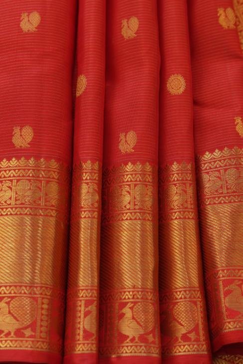 An all red bridal Kanjeevaram Saree